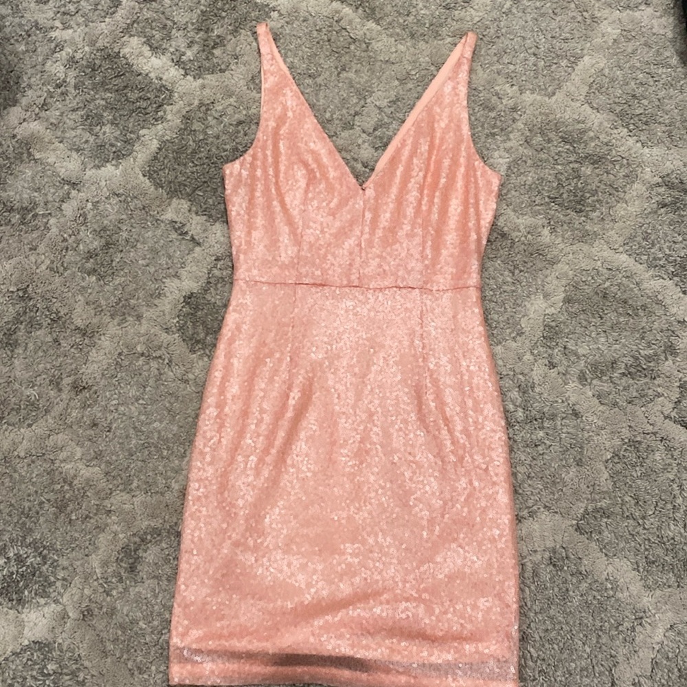 Pink sparkly dress from a local boutique! Never worn but no tags!